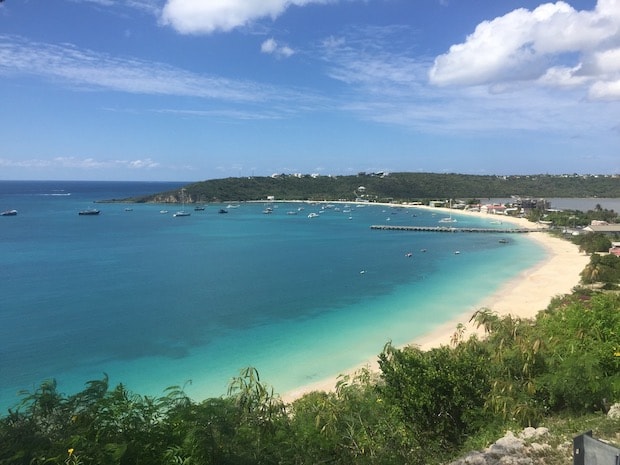 A photograph of a warm sandy coastline.