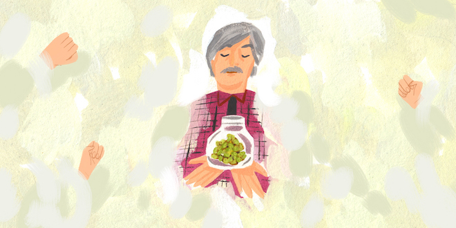 A man bring a jar of medical marijuana from on high.